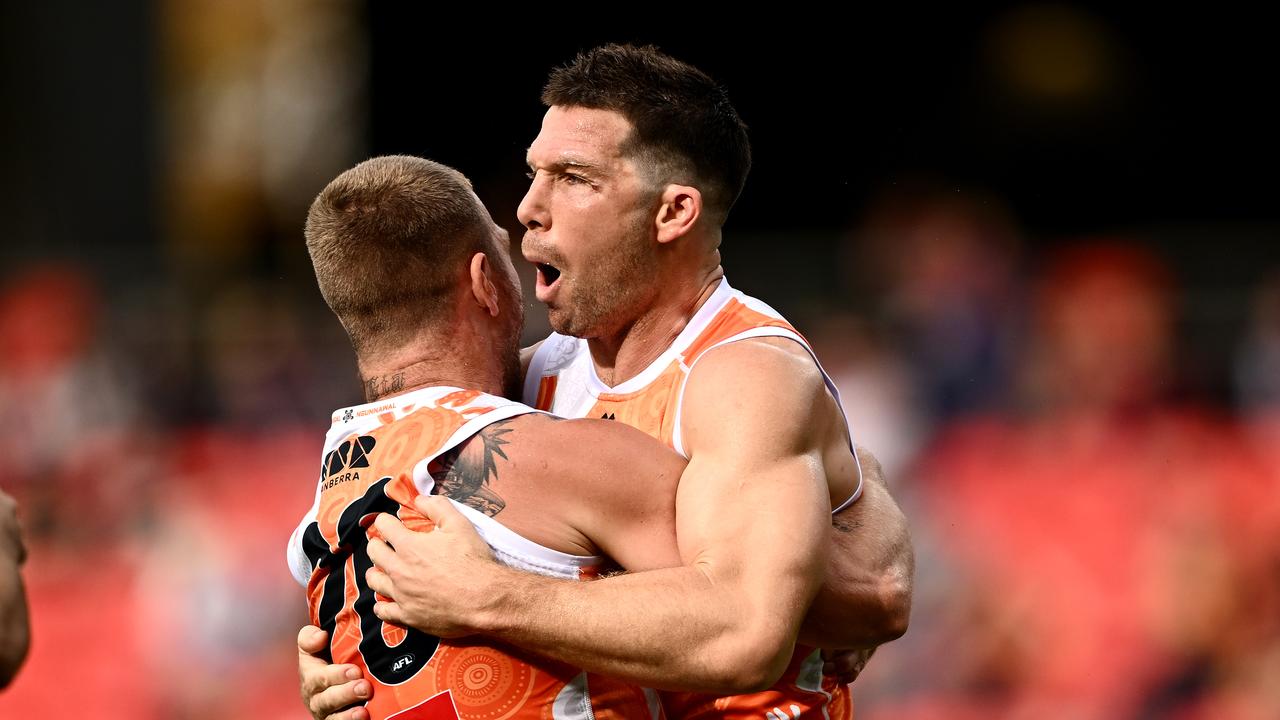 Toby Greene of the Giants (right) celebrates with Jake Stringer