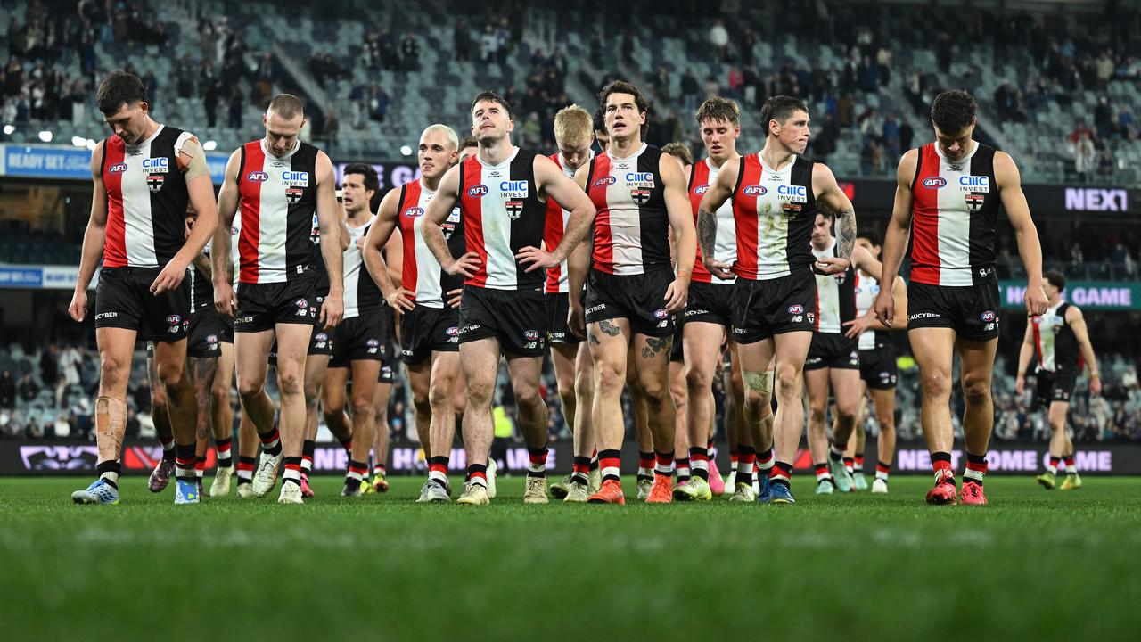 St Kilda players leave the field after their loss to Geelong.
