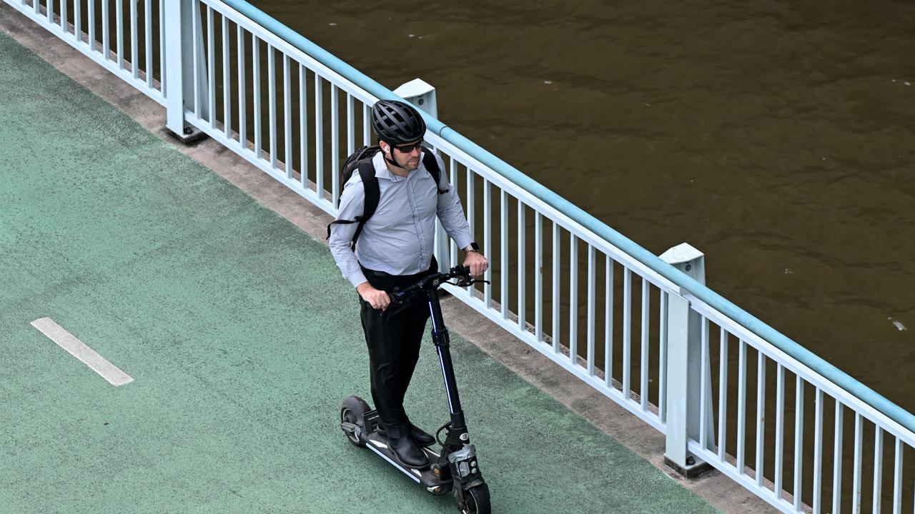 A person riding an e-scooter