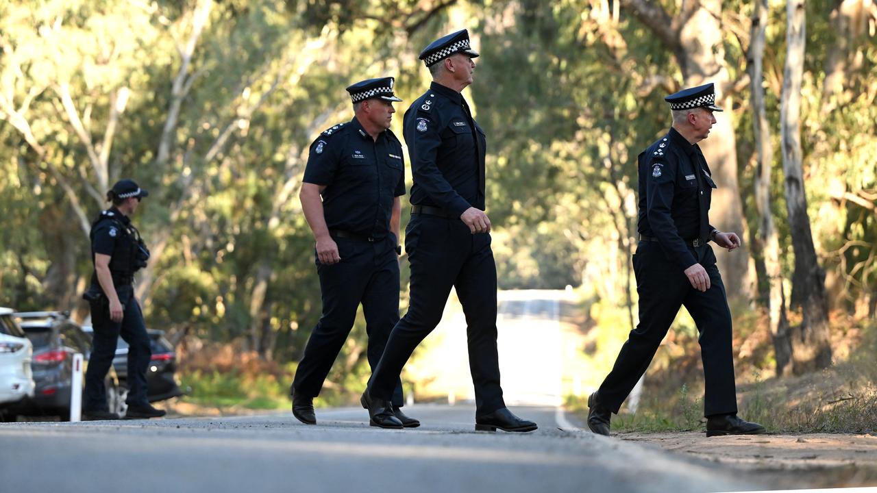 Chief Commissioner of Victoria Police Mike Bush (centre)