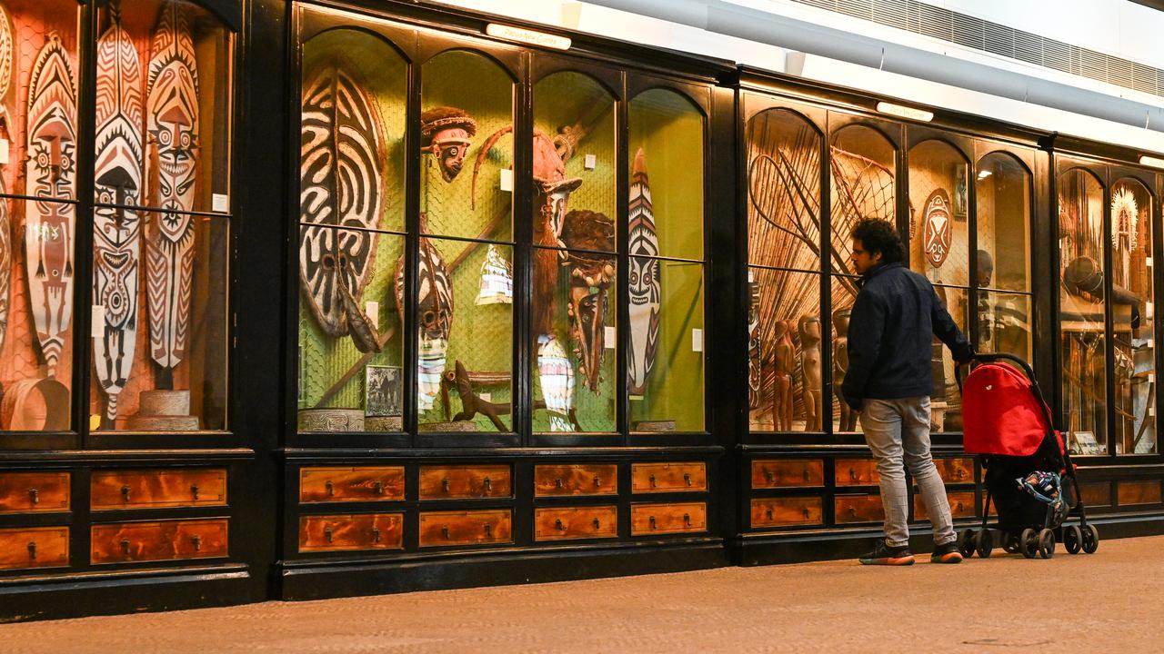 A person looks at museum displays