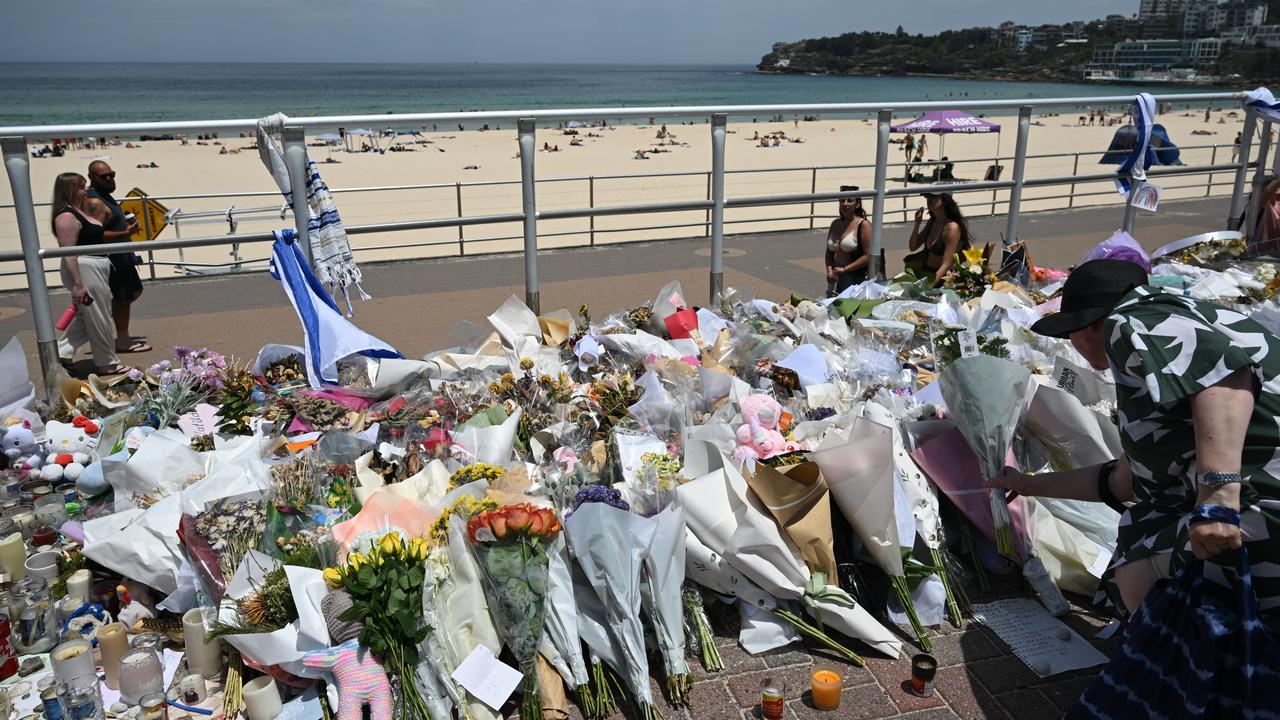 Floral tributes on Bondi Beach promenade (file image)