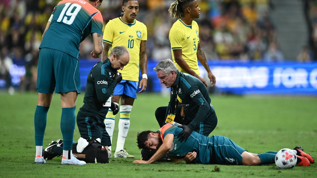 Jacob Italiano of Australia receives treatment