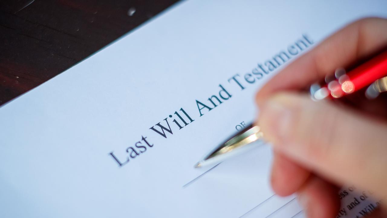 A will being signed (file image)