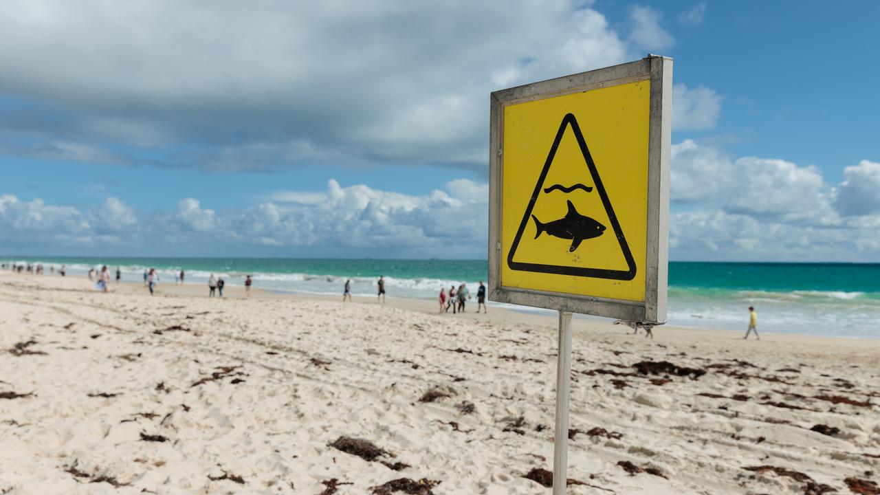 A shark warning sign on City Beach