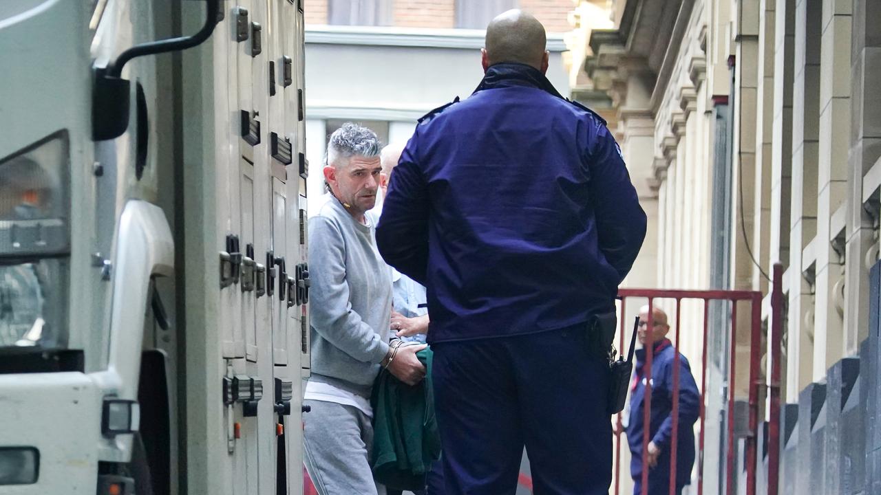 Marc Robertson leaves prison truck