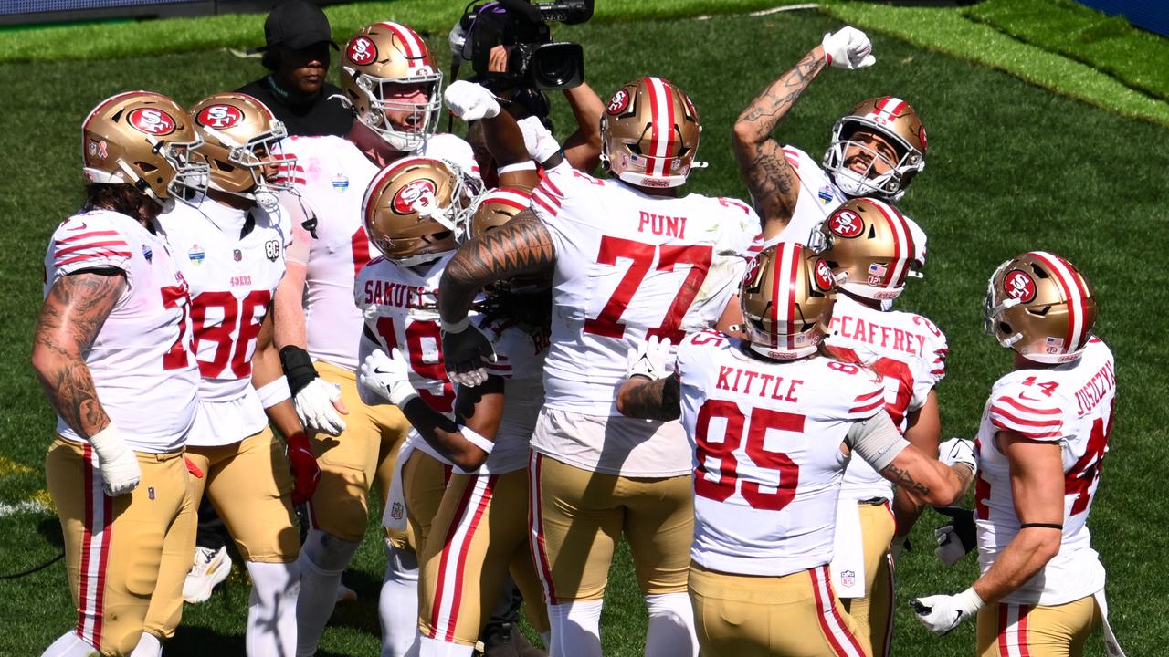 Celebrating 49ers players.