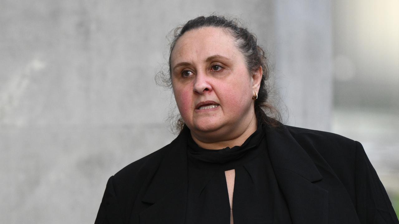 woman leaves courthouse