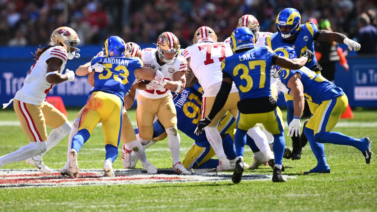 San Francisco running back Christian McCaffrey (centre).
