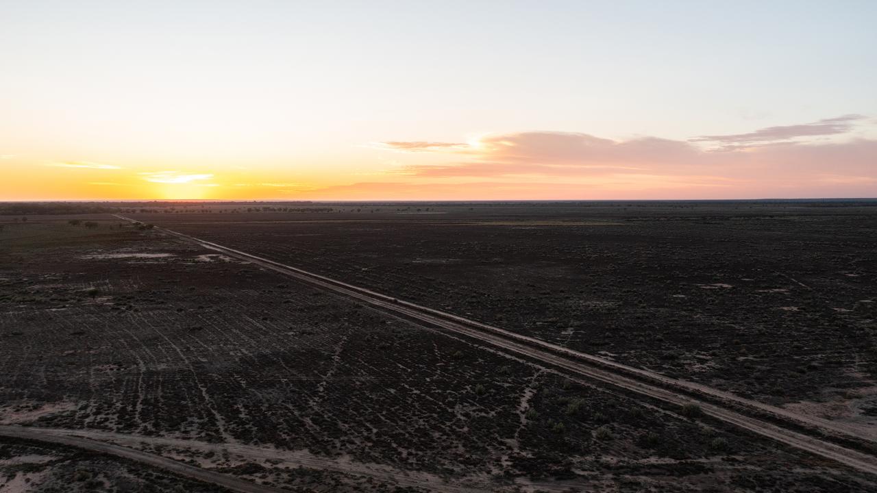 Sunrise over a dirt road