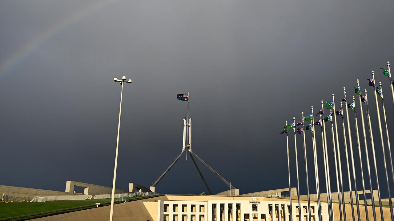 A photo of a rainbow of Parliament House's main entrance in Canberra.