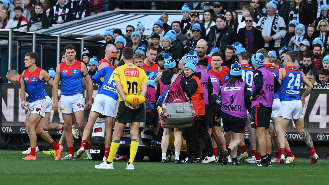 Melbourne players rushed to comfort Brody Mihocek