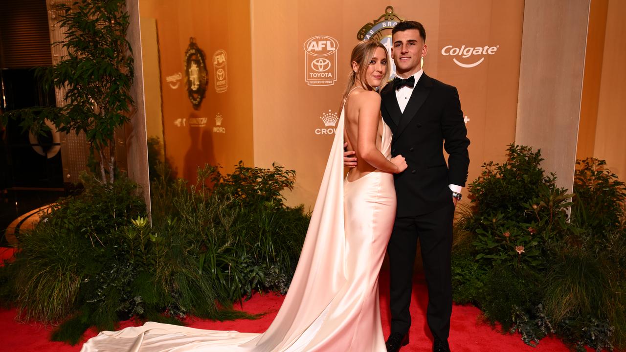 Collingwood's Nick Daicos and partner Arlette Amor
