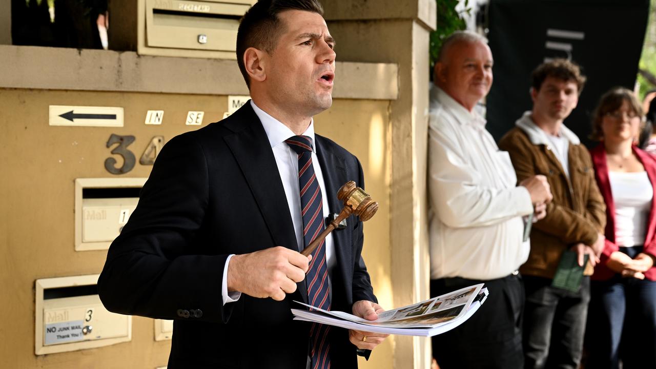 An auctioneer presides over a property sale (file image)