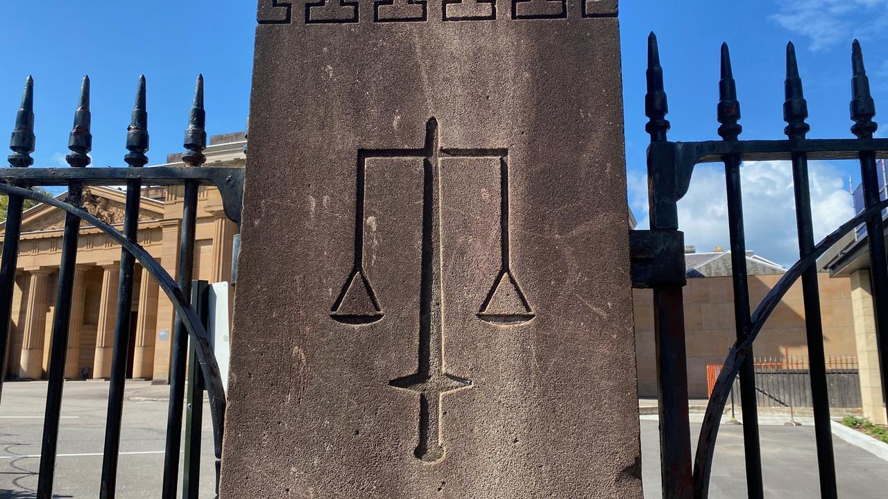 The scales of justice engraved on a pillar (file image)