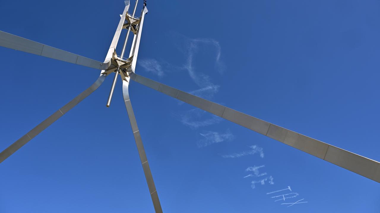 A skywriting plane writes 
