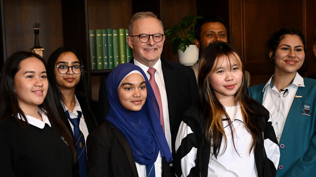 Anthony Albanese with students (file image)