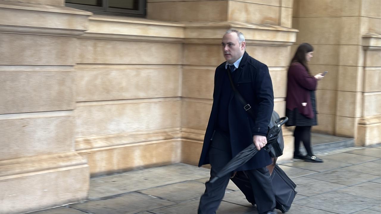 Michael Foundas oustide court