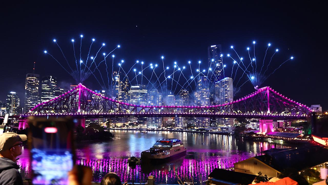 Fireworks explode over the story bridge
