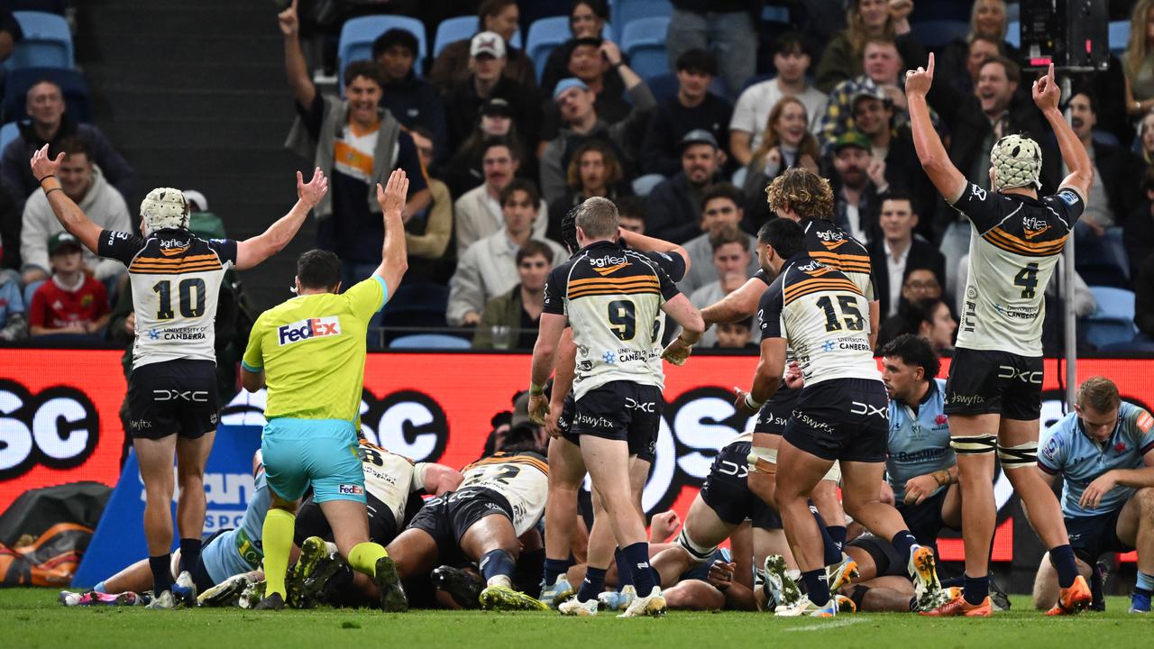 Celebrating ACT Brumbies players.