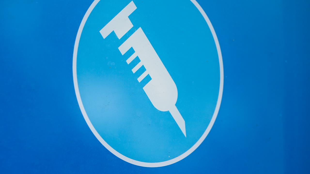 A sign advertising vaccinations
