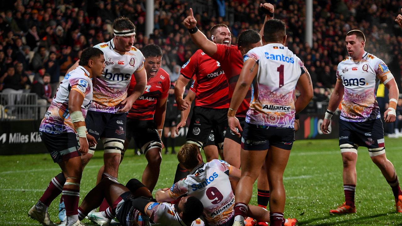 Crusaders players celebrate.