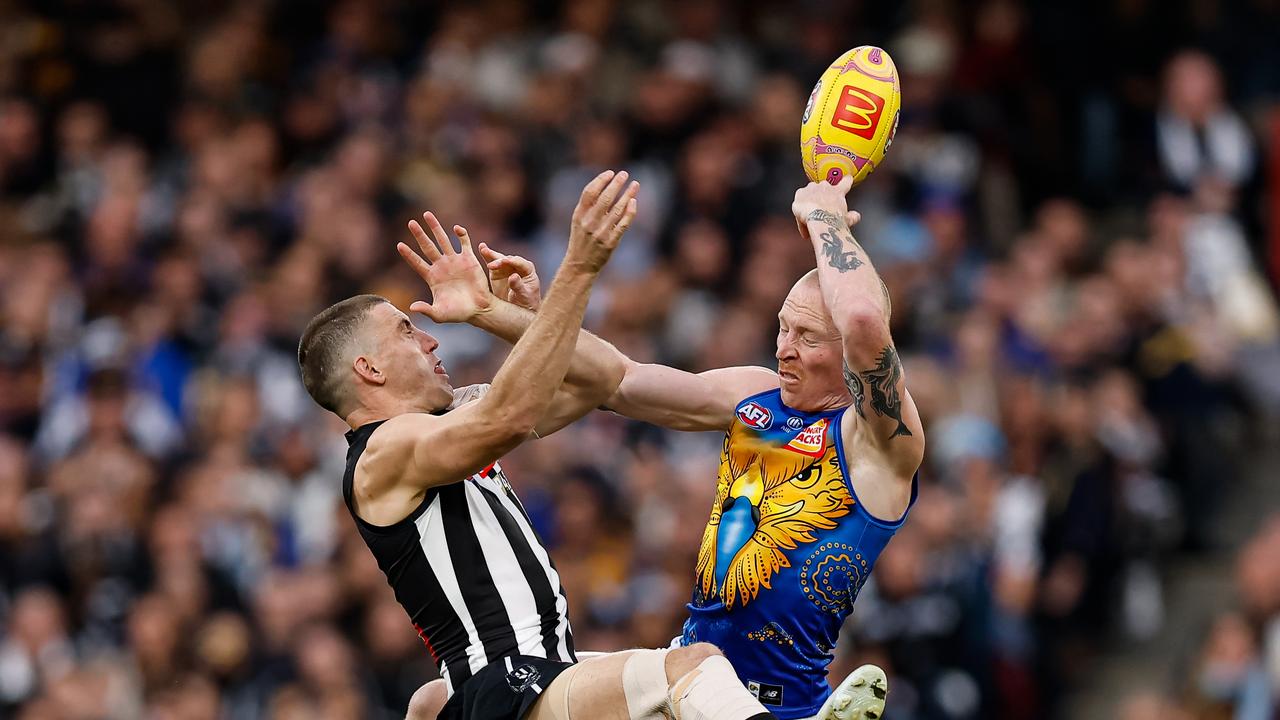 Collingwood's Darcy Cameron and the Eagles' Bailey J. Williams